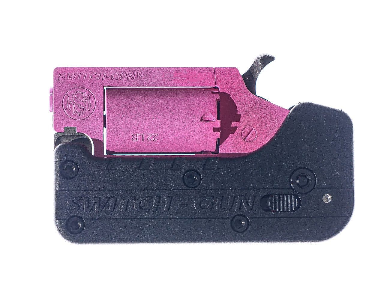 Standard Manufacturing Switch Gun .22 LR featuring a pink Cerakote finish over a stainless steel frame, a 5-round capacity, and a compact folding design.