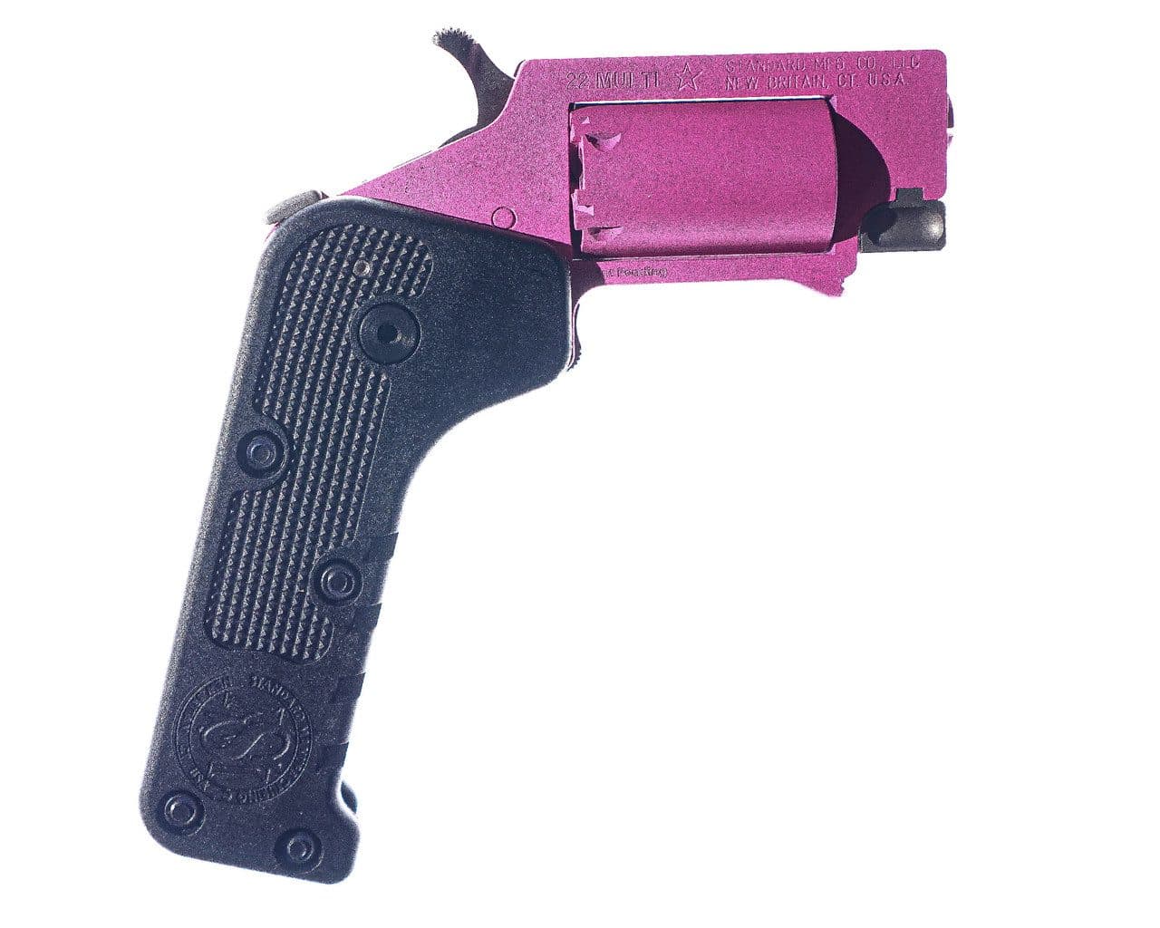 Pink Standard Manufacturing Switch Gun .22 WMR featuring a CNC-machined stainless steel frame, durable Cerakote finish, 5-round capacity, and compact folding design.