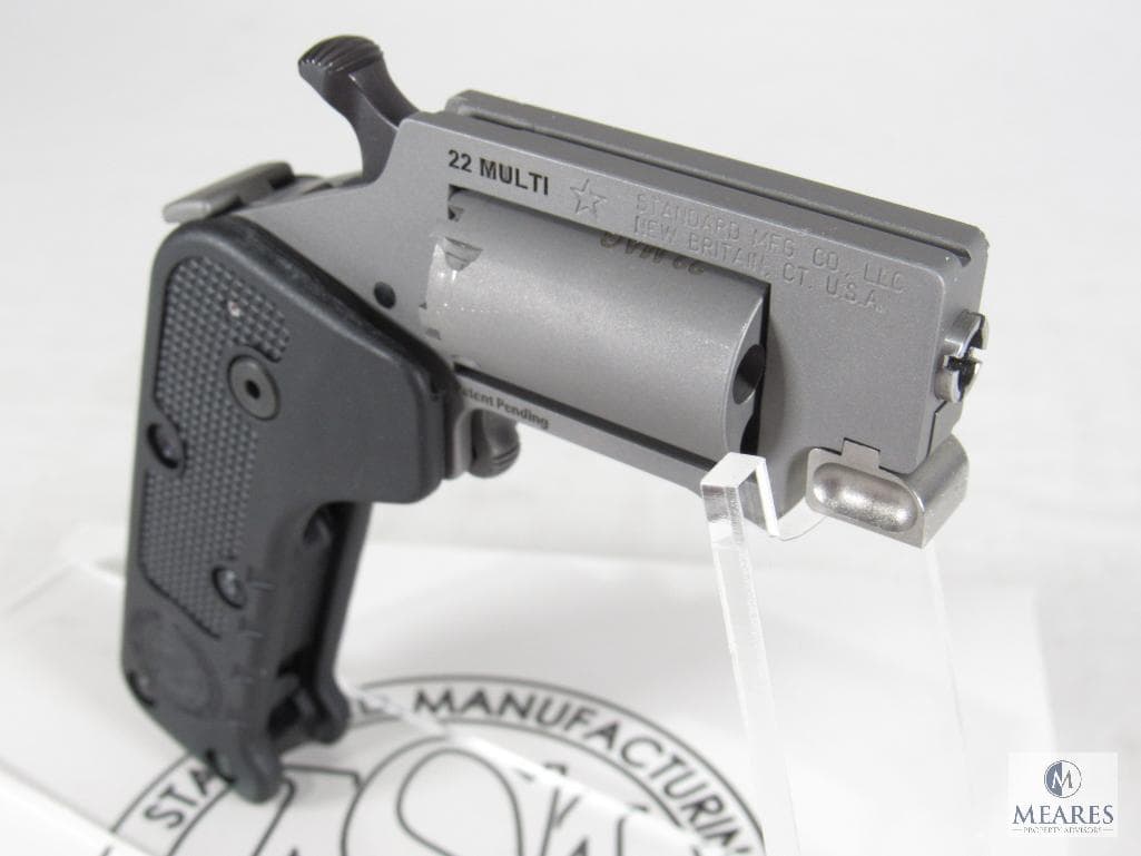 Switch Gun .22 folding revolver carried outdoors for hiking, backpacking, and trail use with a focus on lightweight concealed carry and backcountry preparedness.